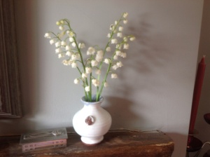 A dinky pot with lily-of-the-valley 